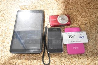 Four electronic items displayed: Scepter tablet, Apple iPhone A1303, Apple iHome IH-W-PP2058, Sony Cyber-shot camera. Auction tag: "107, 4 times."