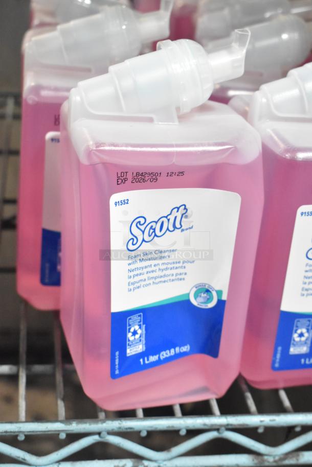 Lot of cleaners including Scott Foam Skin Cleanser, 1L bottle with moisturizers, expiration 2026/09, visible lot number.