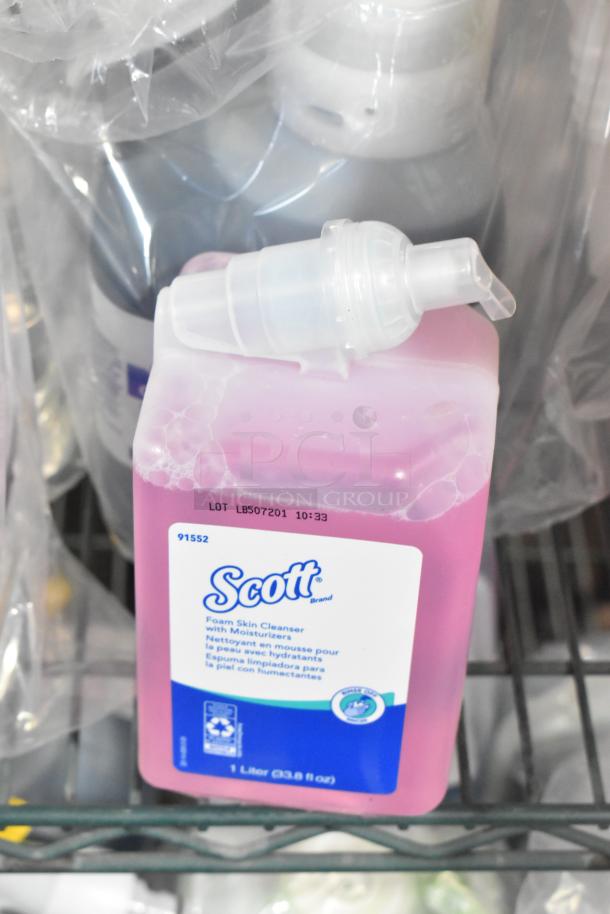 Two-tier lot of cleaning products including Diversey Wiwax Emulsion, Restroom Cleaner, and Scott Foam Skin Cleanser.