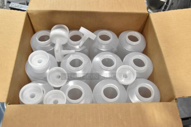 Box of new Tablecraft 124C-1 clear cone tip squeeze bottles, 24 oz, 38 mm opening, includes several bottles with caps.