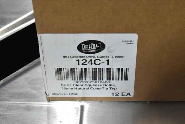 Box of Tablecraft 124C-1, 24 oz. clear cone tip squeeze bottles, 12-pack. Label shows model and manufacturing info.