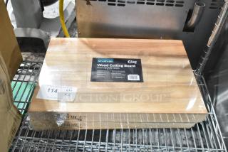 Brand new Choice 18"x12"x1.75" wood cutting board with squared edges, model 407WCB1812, in original packaging.