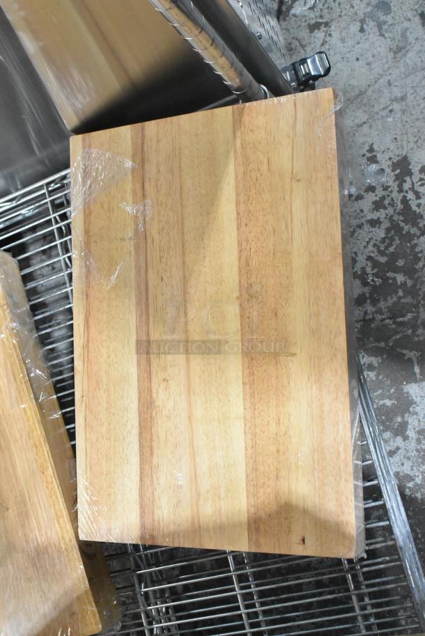 2 brand new 407WCB1812 Choice wood cutting boards, 18"x12"x1.75", squared edges, slight scratch and dent.