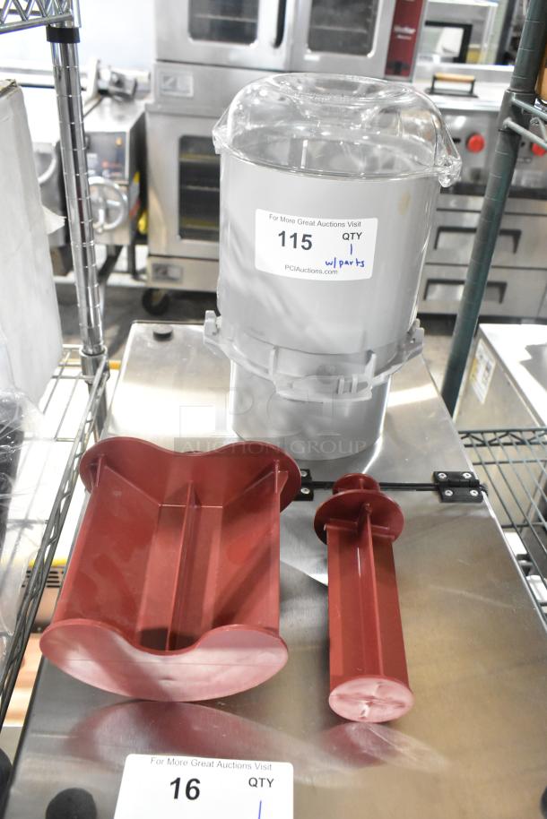 Lot of Robot Coupe food processor accessories including bowl, continuous feed head, S blade, and pusher, brand new.