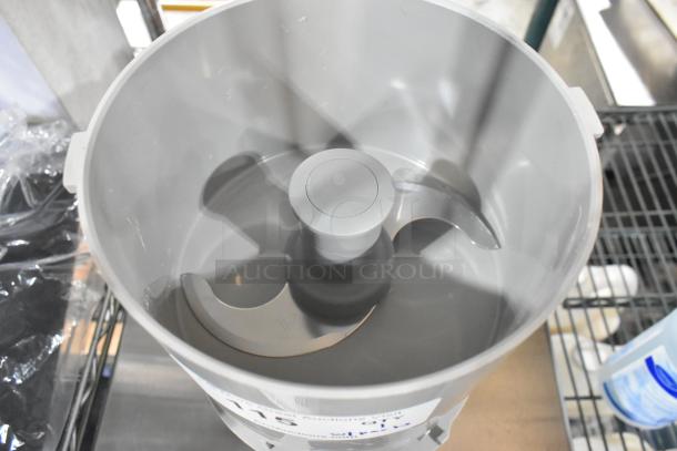 Brand new Robot Coupe food processor accessories, including bowl, S blade, continuous feed head, and pusher. Scratch and dent condition.