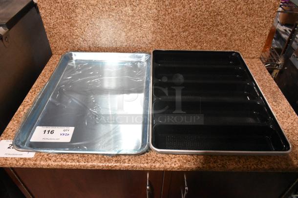 20 new items including a 407BUNHALF 13"x18" aluminum sheet pan and a 1517 metal 5-slot non-stick bread pan.