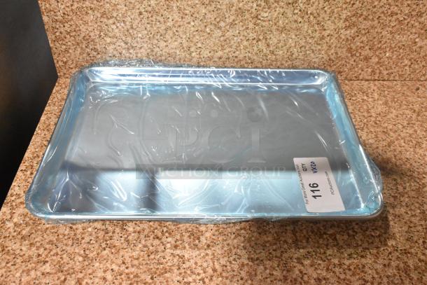 20 brand new aluminum sheet pans, 13" x 18", wrapped in plastic, item tag shows auction lot number 116.