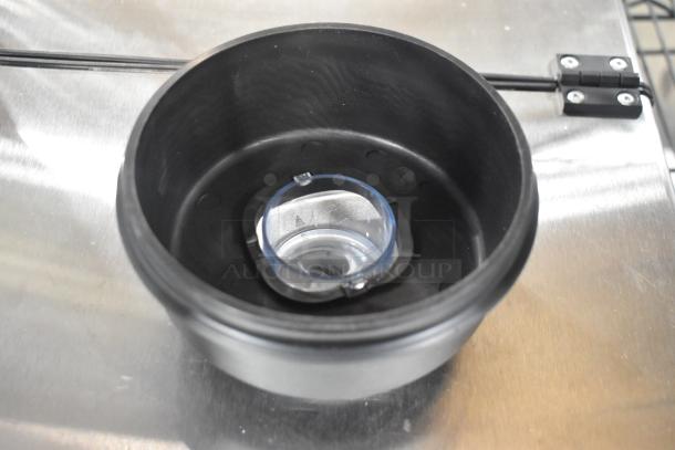 Black blender pitcher, new condition; part of scratch and dent set including Avantco Ice 19491769 ice scoop.