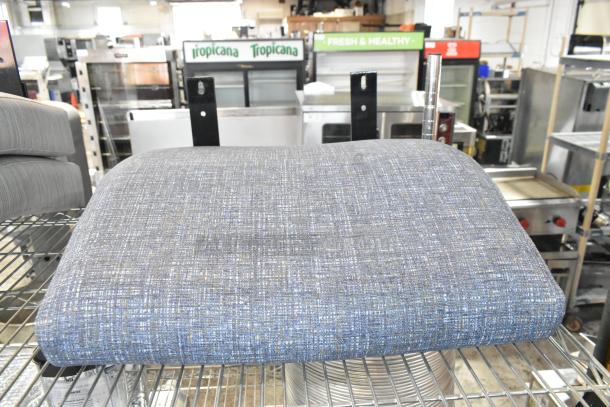 Brand new seat cushion with textured blue fabric, slight scratch and dent condition. Suitable for home or office use.