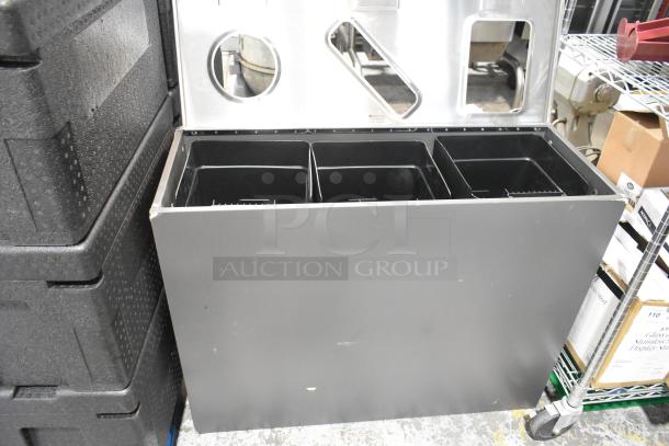 Busch Systems stainless steel trash can shell, brand new with scratches and dents, featuring multiple sorting compartments.