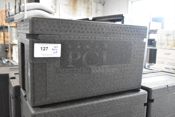 19 black polyfoam insulated portable coolers, stackable design, excellent condition, auction lot tag indicating quantity 19.