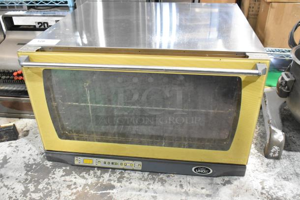 Cadco Unox XAF195 stainless steel commercial countertop convection oven, visible controls, used condition.