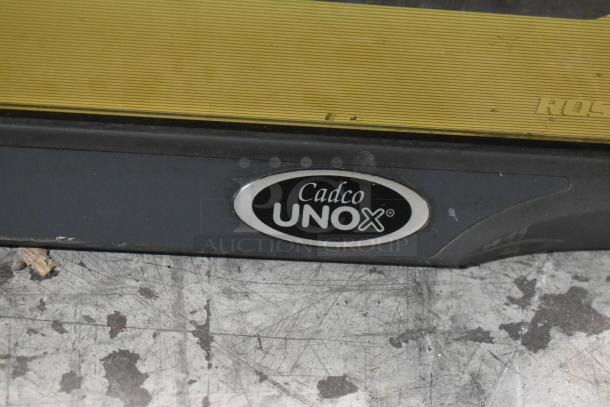 Cadco Unox XAF195 convection oven featuring stainless steel design, countertop model, electric powered, visible brand logo.