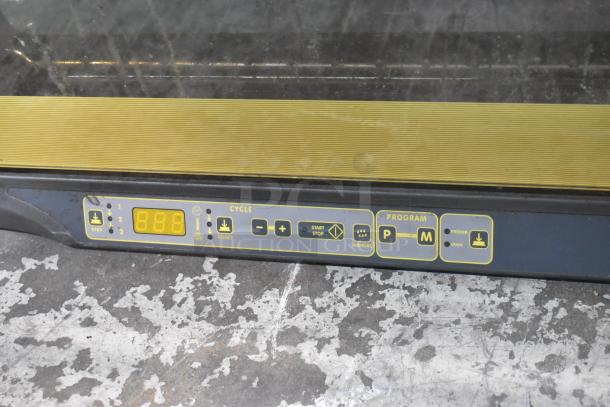Cadco Unox XAF195 convection oven control panel, shows digital display and function buttons, stainless steel design.