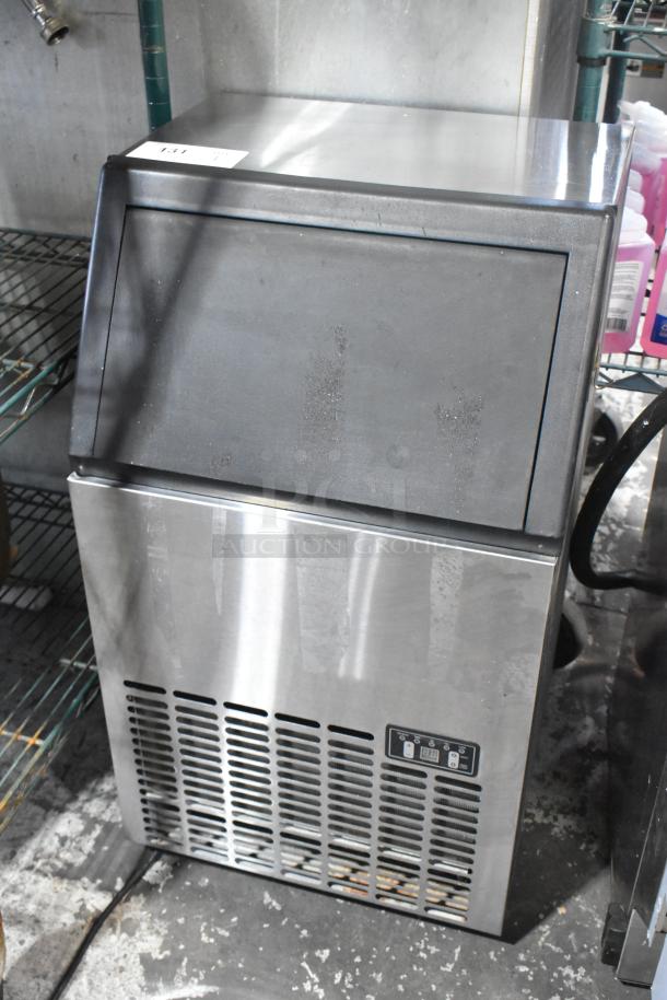 Costway EP21967 stainless steel undercounter ice machine, 115V, 1 phase. Features control panel and ventilation on front, good condition.