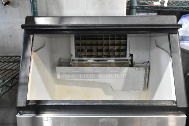 Costway EP21967 stainless steel undercounter ice machine, 115 volts, commercial use. Visible internal ice compartment.