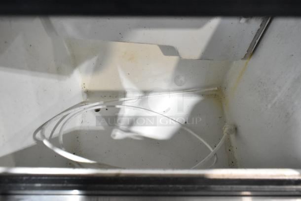 Costway EP21967 stainless steel undercounter ice machine interior. Visible cable, moderate wear. 115V, 1 phase.