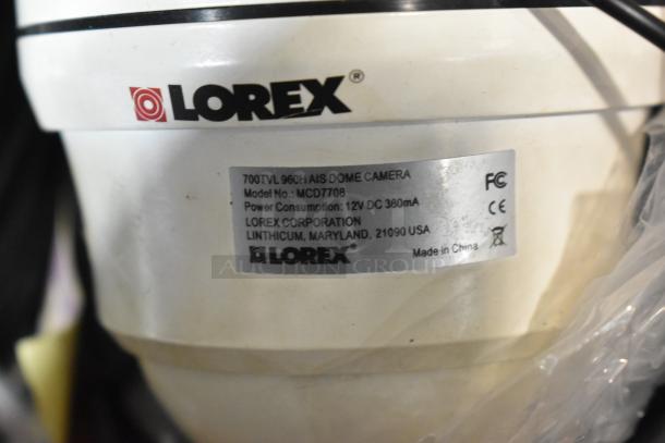 Lorex LDC7708PK4B Dome Camera, 700TVL, model MCD7708, 12V DC, 380mA, good condition, label with specifications visible.