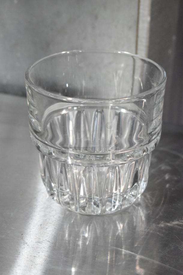 Box of 34 Libbey 15435 Everest 12 oz. stackable rocks glasses, new with minor scratches, clear glass design.