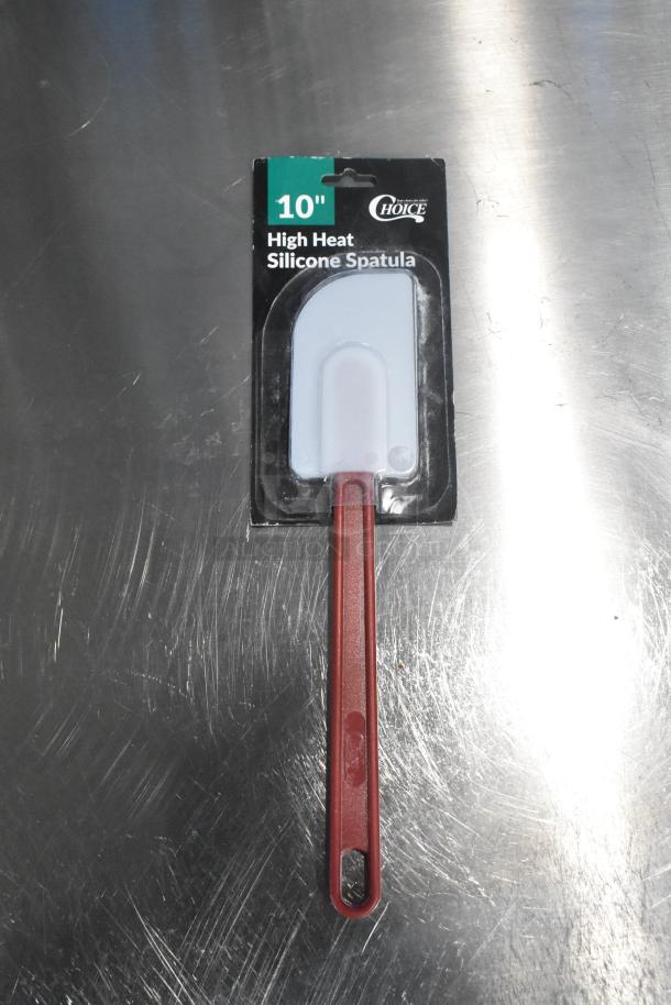 10" Choice High Heat Silicone Spatula in packaging, red handle, brand new, heat-resistant blade.