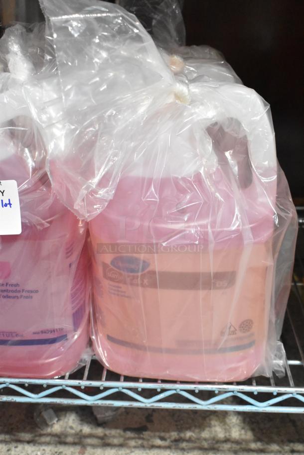 Tier lot of cleaning supplies including sealed Diversey Pan Clean Detergent, Scott Foam Skin Cleanser, Purell Sanitizer.