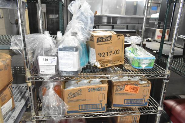 Two-tiered lot with Purell 9217-02 sanitizing wipes, Diversey cleaner, Brighton foam soap refill, in original packaging.
