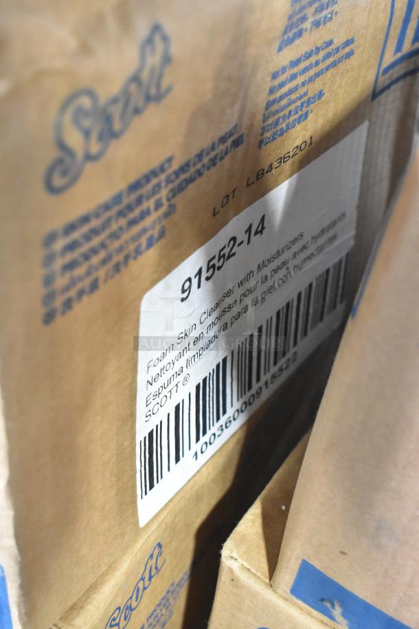 Packaged Scott Foam Skin Cleanser with label "91552-14," visible barcode, and branding. Item part of diverse auction lot.