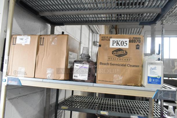 Tiered lot on a metal shelf, including Gojo Foam Handwash, Scott Foam Skin Cleanser, and Clorox Bleach Germicidal Cleaner in labeled boxes.