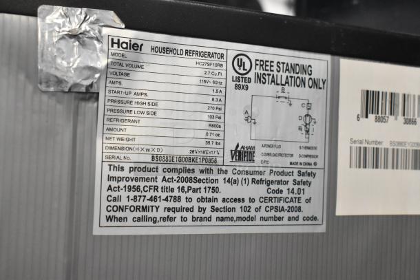 Haier HC27SF10RB Mini Cooler, 115V, 1 Phase. Features label showing model number, specs, and safety compliance details.