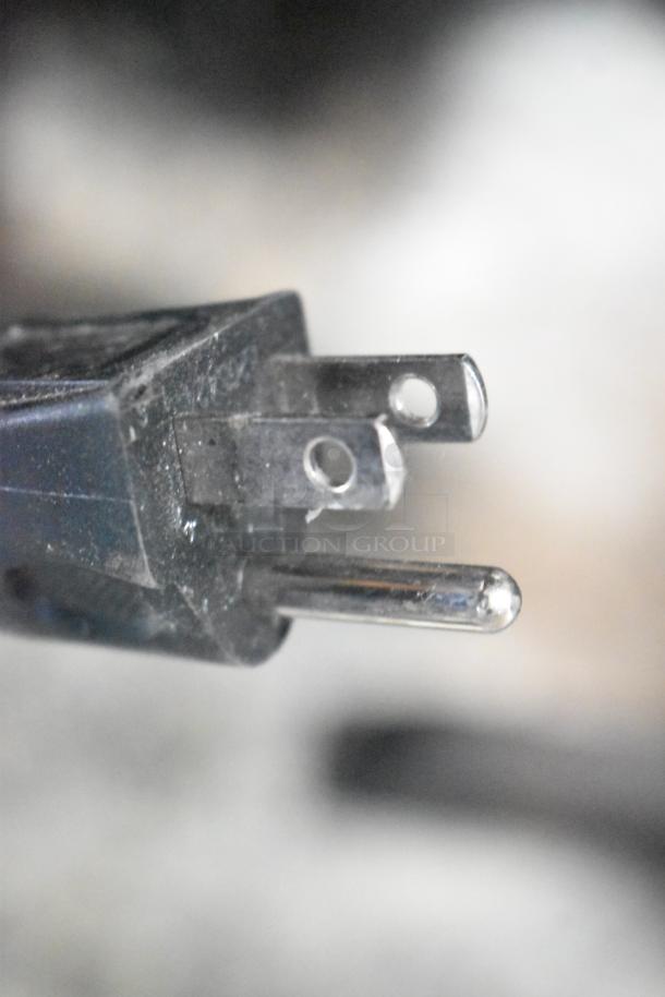Close-up view of a power plug, associated with Galanz GL43S5 Mini Cooler, 115 Volts, 1 Phase.