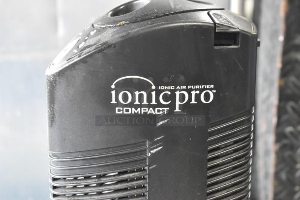 Envion Ionic Air Purifier, black, compact design, visible scuffs. Ionic Pro branding. 115 Volts, 1 Phase.
