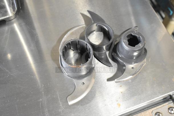 Black & Decker food processor blades with protective hard case, showing two blade attachments in good condition.