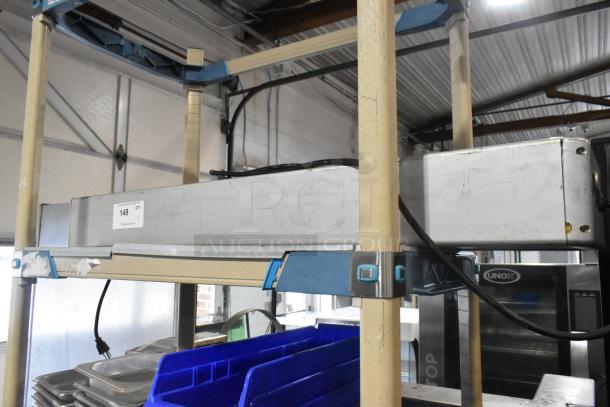 LED-2 Light Up Sign, 120 Volts, 1 Phase. Visible label indicates "149 QTY" on a metal shelving unit.