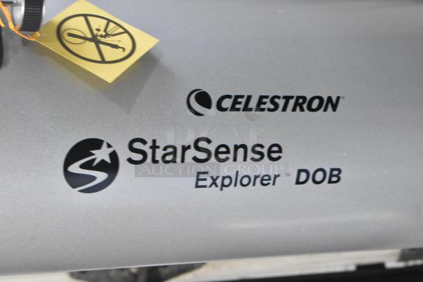 Celestron StarSense Explorer DOB Telescope, model 22470. Aperture 203mm, focal length 1200mm. Appears in good condition.
