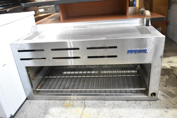 Imperial ICMA-36 stainless steel commercial cheese melter, natural gas powered, ventilation slots, lightly used.