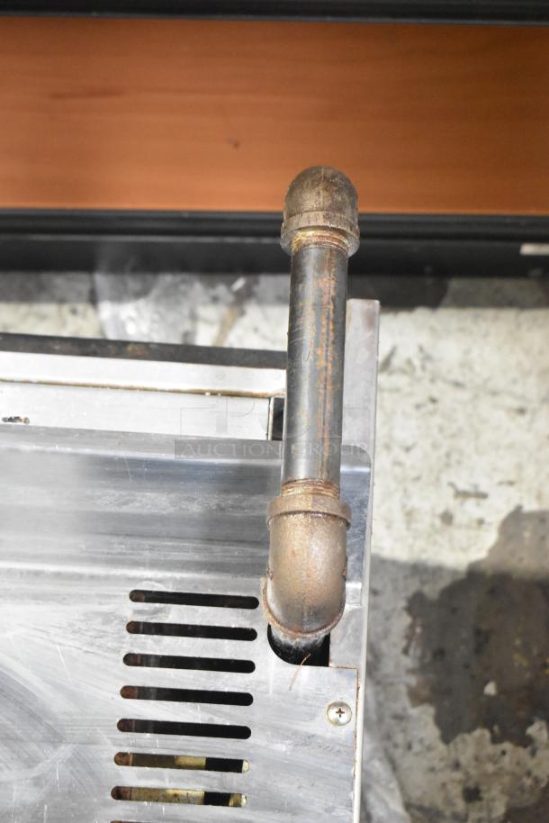 Imperial ICMA-36 stainless steel cheese melter, natural gas powered, showing vent details and gas pipe connection.