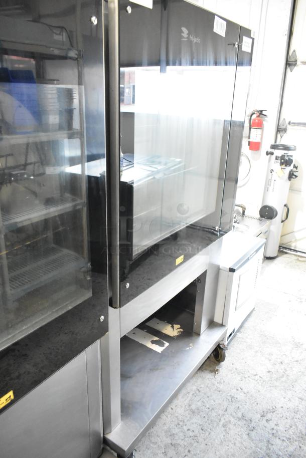 Fri-jado TDR 7-P stainless steel rotisserie oven on commercial casters, electric, 208V, 3 phase, excellent condition.