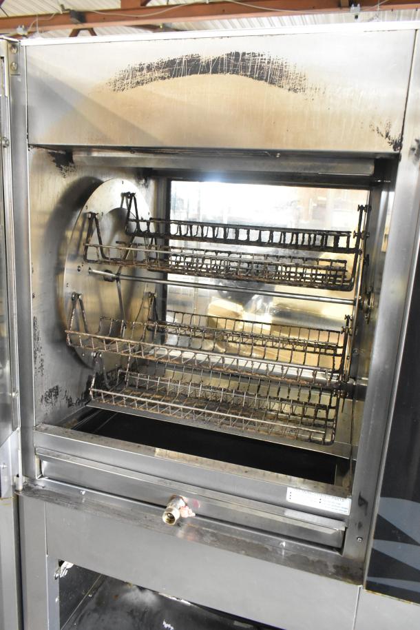 Fri-jado TDR 7-P stainless steel rotisserie oven on casters, electric powered, 208V, 3-phase, visible wear.