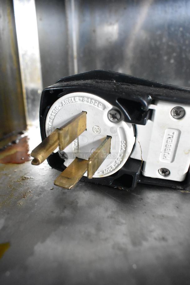 Fri-jado TDR 7-P stainless steel rotisserie oven plug, 208V, 3-phase connection, commercial-grade with metal casing.