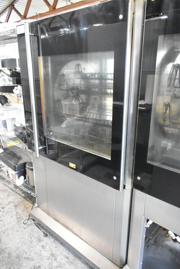 Fri-jado TDR 7-P stainless steel rotisserie oven on casters in good condition. 208V, 3-phase electric, commercial-grade.
