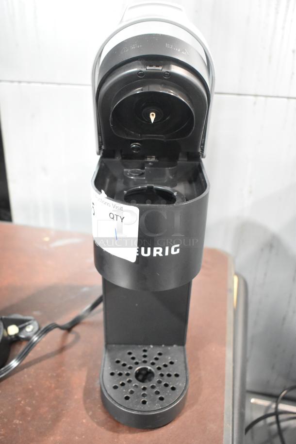 2024 Keurig Single Cup Coffee Machine, black, 120V, 1 Phase. Open lid, good condition, visible brand logo.
