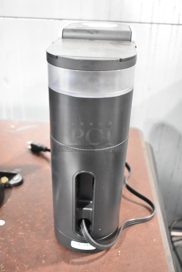 2024 Keurig Single Cup Coffee Machine, black, 120 Volts, 1 Phase, with visible cord and barcode label.