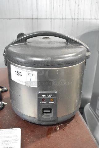 Tiger JNP-S18U rice cooker/warmer, stainless steel, 120V, 1 phase. Features rice cooking and keep warm settings.