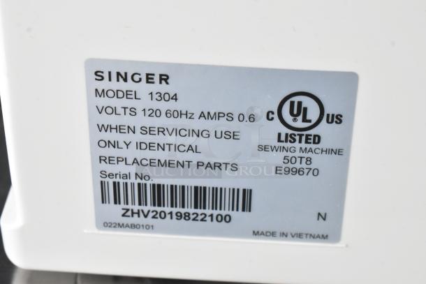Singer Model 1304 sewing machine label, 120V, 60Hz, 0.6A. UL listed. Made in Vietnam. Serial No. ZHV2019822100.