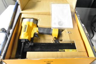 DeWalt DW451S2 Wide Crown Lathing Stapler in original packaging, appears unused, with visible brand label and instruction manual.