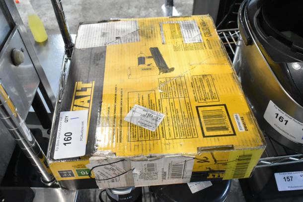 DeWalt DW451S2 Wide Crown Lathing Stapler in original packaging, visible wear, includes labels, model DW451S2 marked.