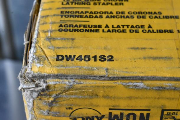 DeWalt DW451S2 Wide Crown Lathing Stapler box, worn condition, model number visible.