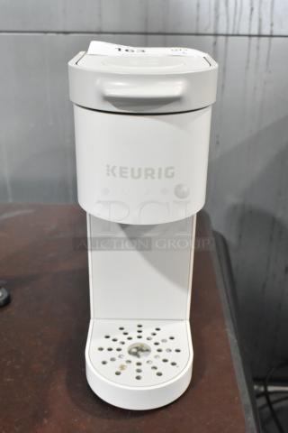 2024 Keurig Single Cup Coffee Maker, white, 120 Volts, 1 Phase, in good condition. Keurig logo visible on the front.
