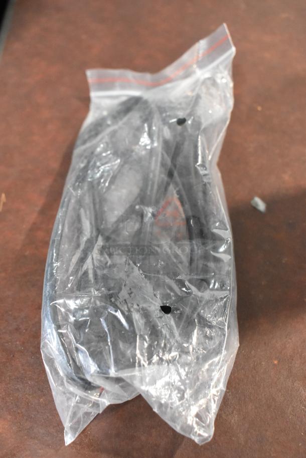 Sealed plastic bag containing cables, possibly for a Sony BDP-S560 Blu-Ray Disc DVD Player accessory.