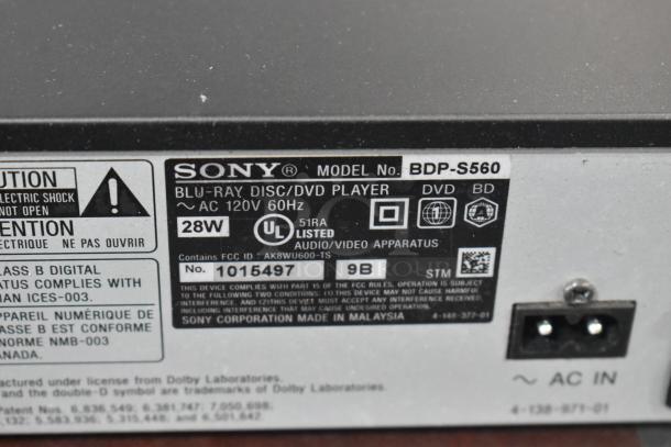 Sony BDP-S560 Blu-Ray Disc DVD Player rear view; model label details, 28W power, made in Malaysia.